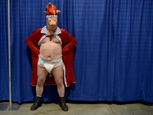 John Marshoff, 45, poses for pictures at the 1st  Annual BaconFest. Marshoff was selected as bacon king at the bacon king and queen contest held at the Harley Davidson in St. Joe, Mo., on Sept. 20. His talent was juggling oranges. 