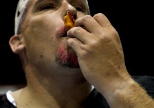 Tracy Gillespie, 42, tries to eat as much bacon as he can during the bacon-eating contest. “To prepare I watched Top Gun, the Rocky movies, and ate a big meal to stretch out the bell, and earlier I did a little running.” Gillespie said. Gillespie won second place. 